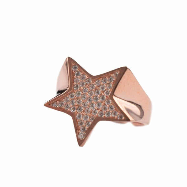 Lillefinger ring med zirkoner i  rosa forgyldt sølv. Formet som en stjerne.