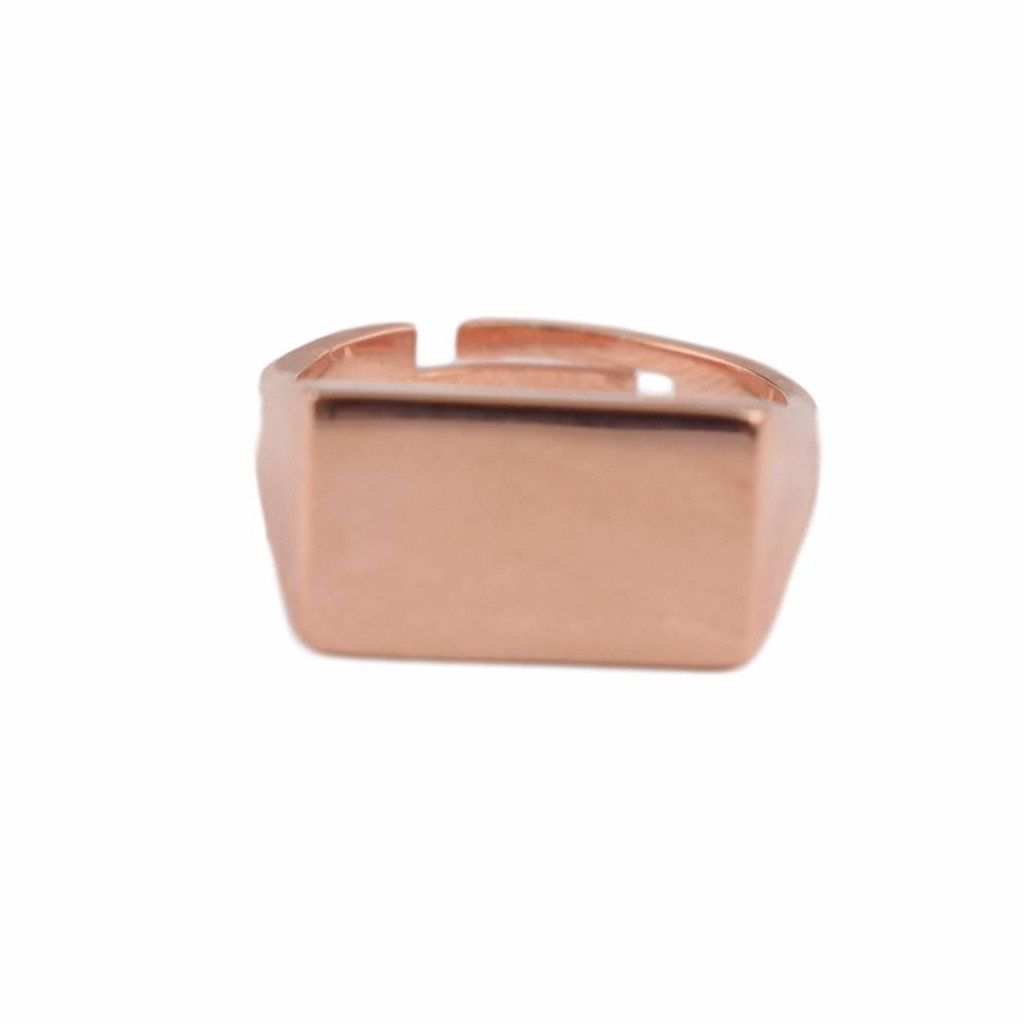 Lillefinger ring med zirkoner i  rosa forgyldt sølv. Rektangulær form